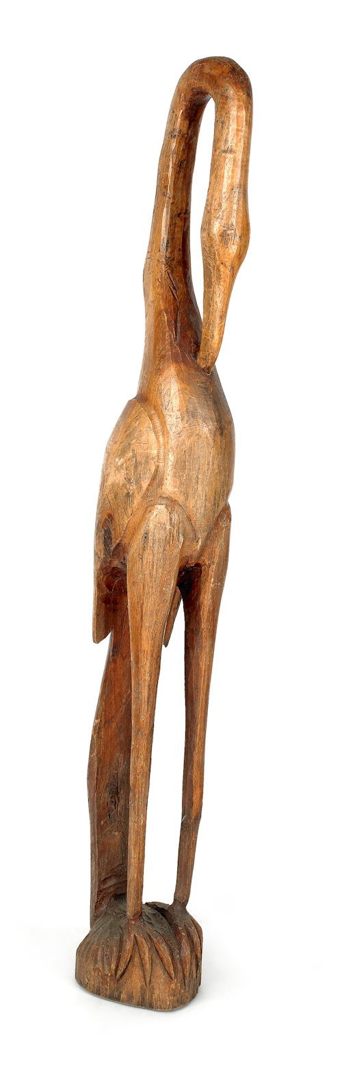 Primitive carved stork garden figure