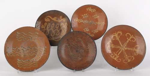 Five American redware chargers