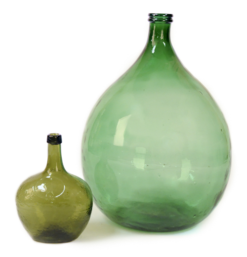 Two green glass demi john bottles 17558e