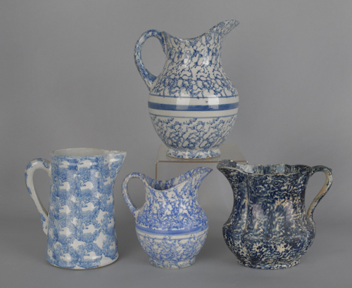 Four spongeware pitchers 19th c  175598