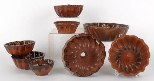 Eight redware food molds 19th c  17559a