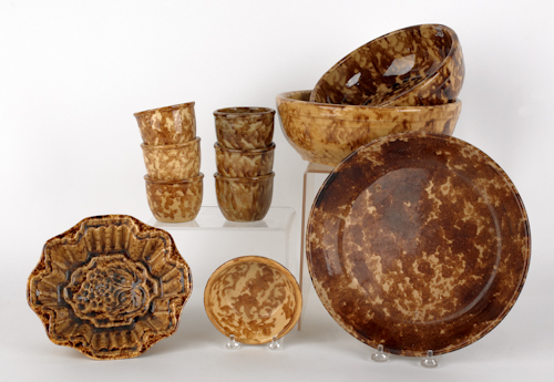 Eleven pieces of Bennington type pottery