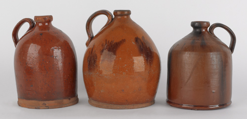 Three Pennsylvania redware jugs 1755a9