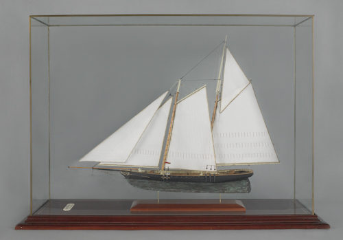 Cased wood ship model of the racing