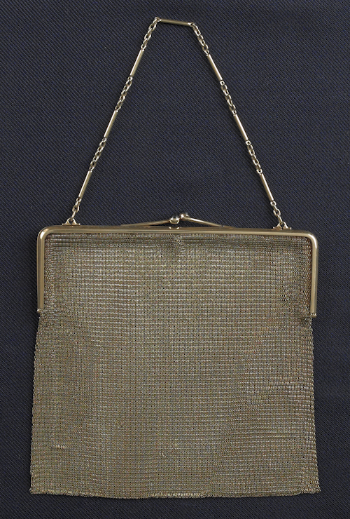 Mesh purse with a 14K gold clasp.