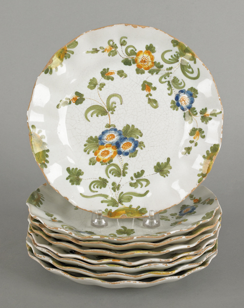 Set of eight faience plates 8 1/2"