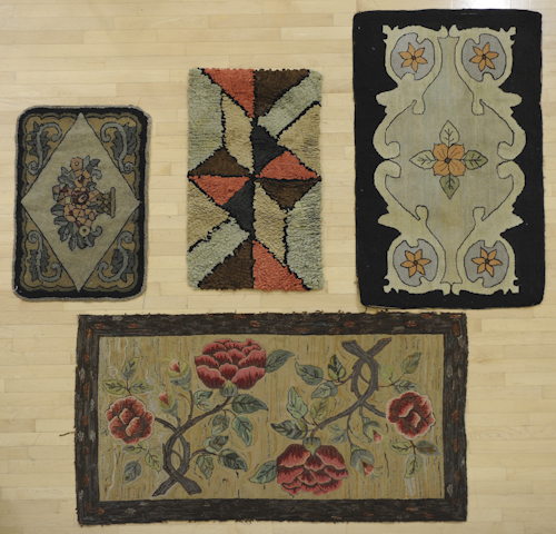 Three floral hooked rugs early