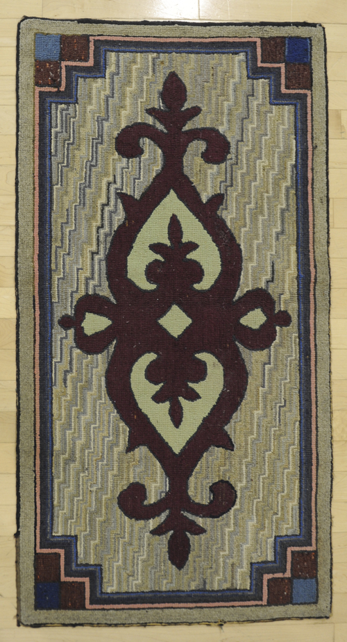 Two geometric hooked rugs early 17576e