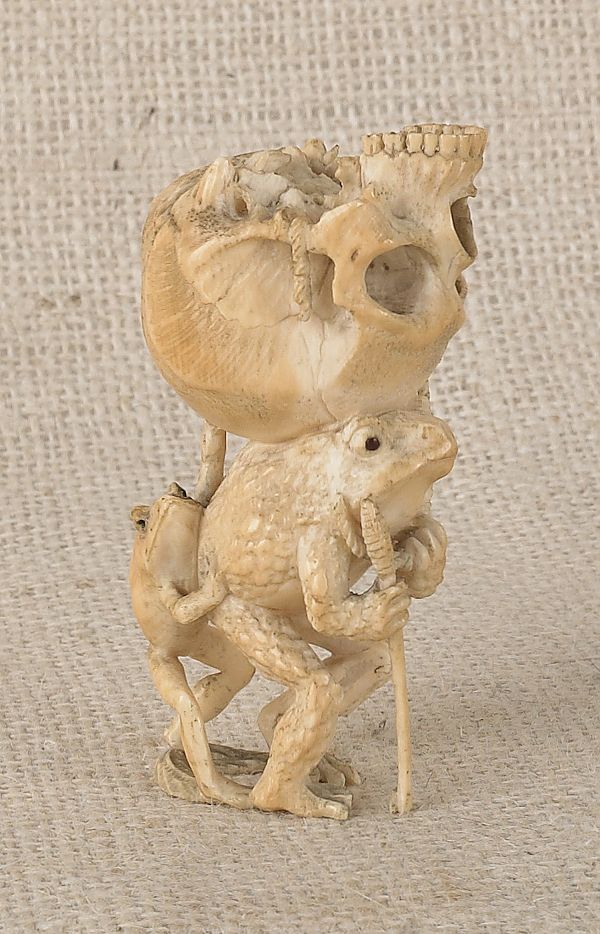 Carved ivory figure of a frog carrying