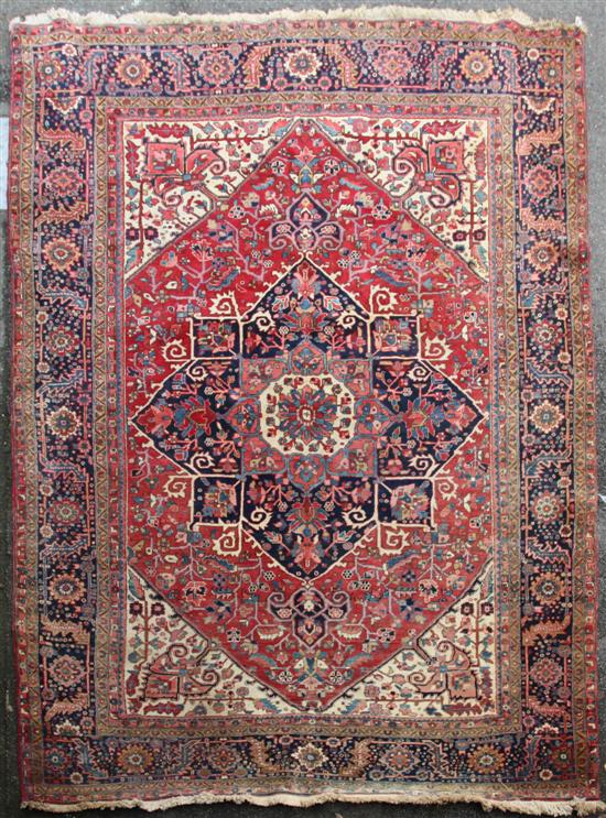 A Heriz carpet the large central