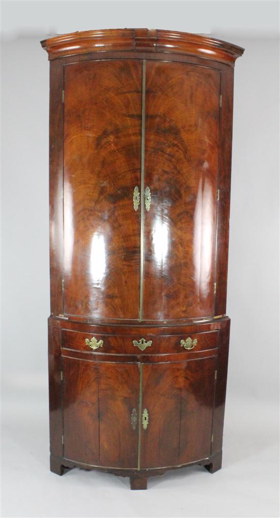 A George II bowfront mahogany corner 1731be