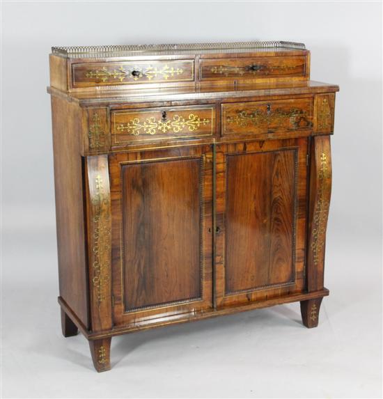 A Regency brass inlaid rosewood 1731ca