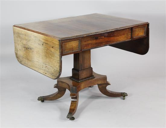 A Regency rosewood sofa table with 1731cd