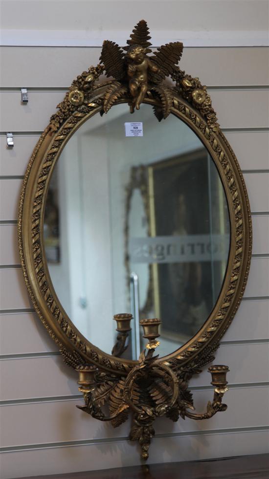 A pair of Victorian carved giltwood