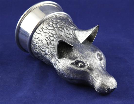 A mid 1960's silver fox head stirrup