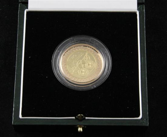 A 2004 gold proof steam locomotive 173320