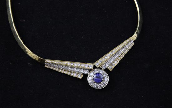 An 18ct gold diamond and tanzanite 17335c