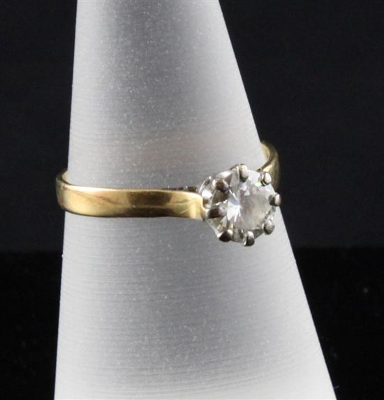 A gold and platinum set solitaire