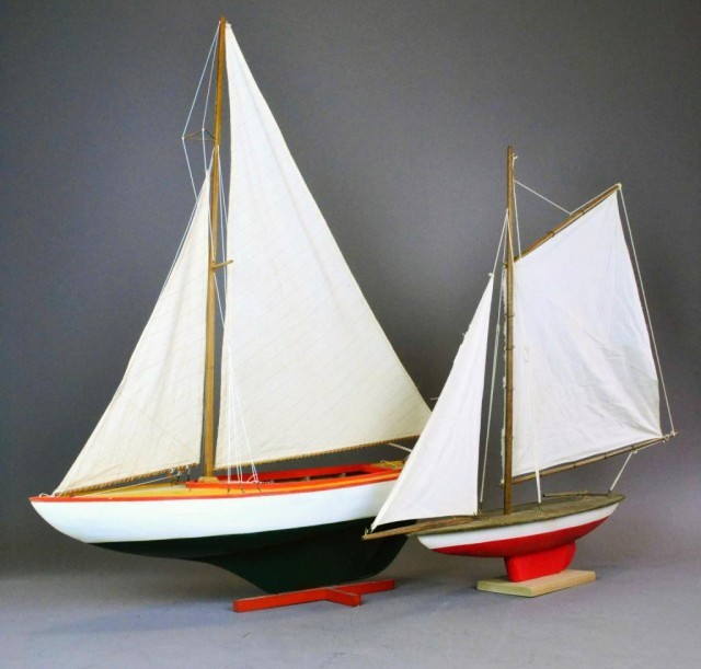  2 AMERICAN POND BOATS ON STANDSTo 17350b