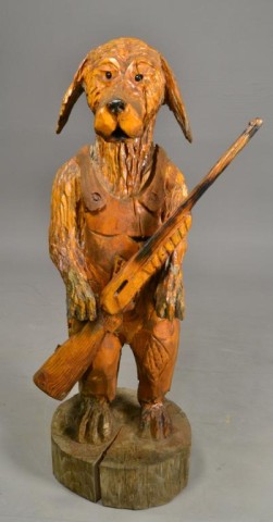 HAND CARVED WOODEN DOG WITH GUNDepicting 173513