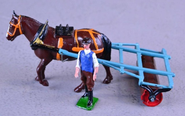 PAINTED METAL BRITISH TOY MAN & HORSE