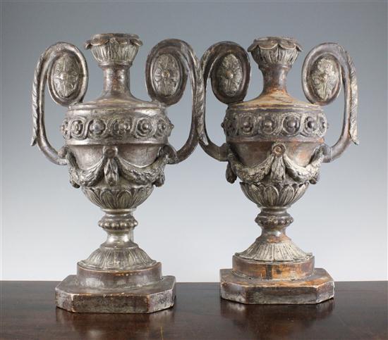 A pair of silver painted carved 173821