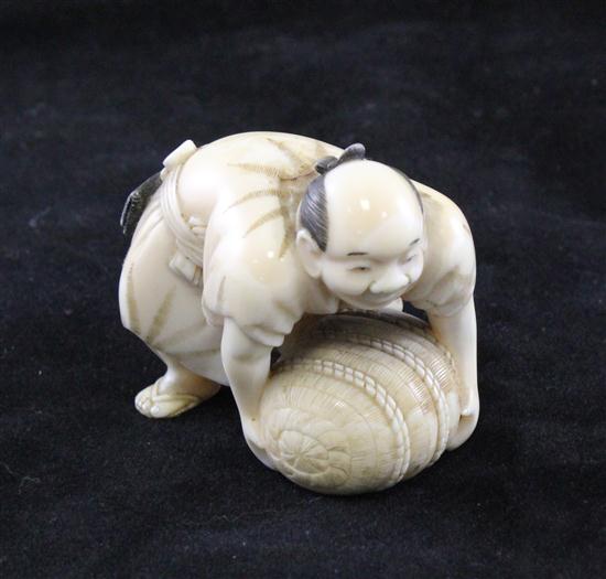 A Japanese walrus ivory figure