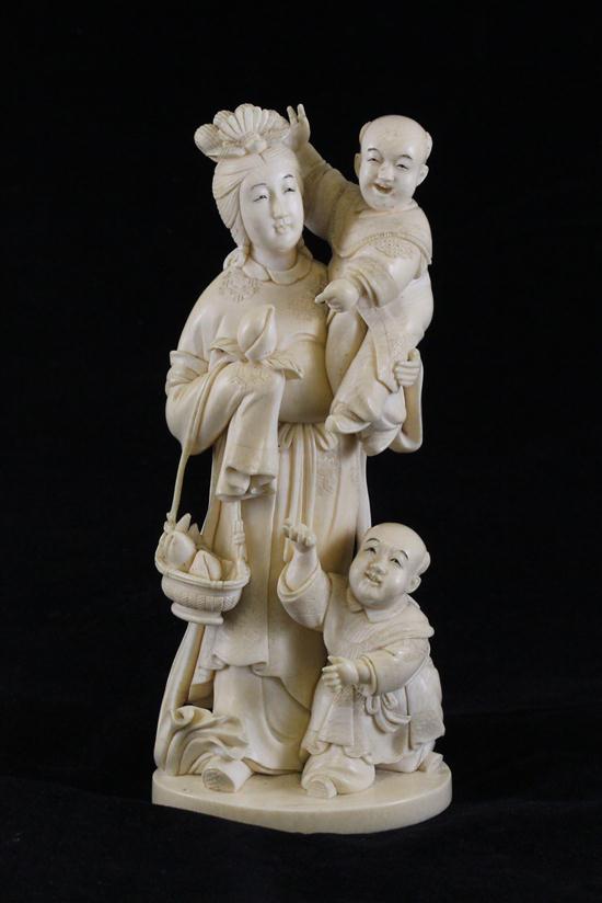 A Japanese ivory group of a goddess