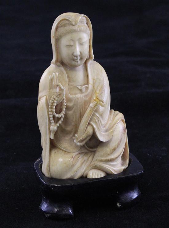 A Chinese ivory seated figure of 173942