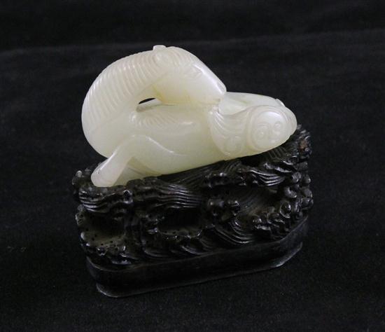 A Chinese pale celadon jade figure 173948