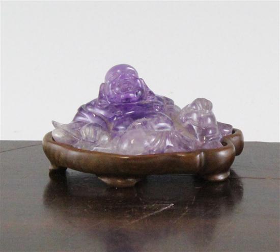 A Chinese amethyst quartz reclining