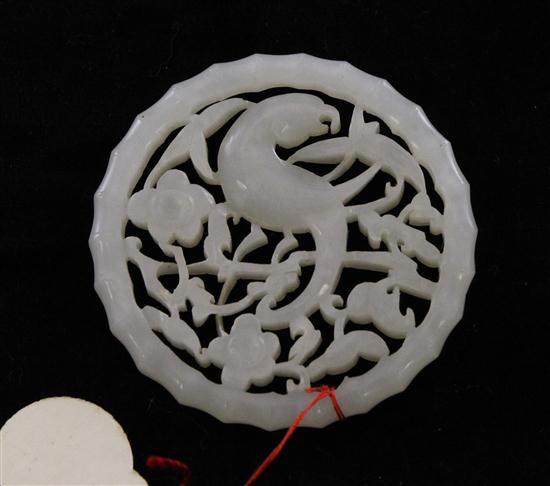 A Chinese white jade circular plaque 173952