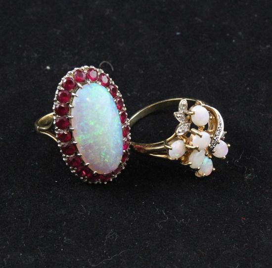 An 18ct gold white opal and ruby 173a86