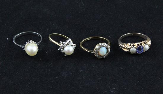 Four assorted gold dress rings