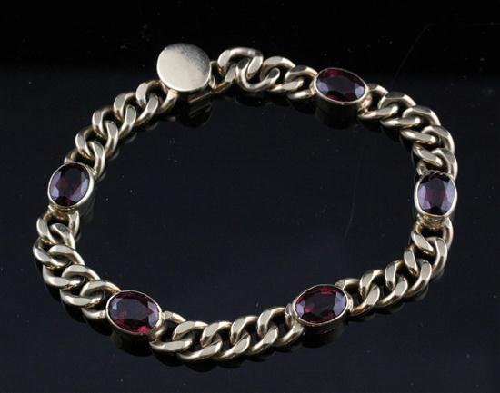 A garnet set gold curblink bracelet 173a9b