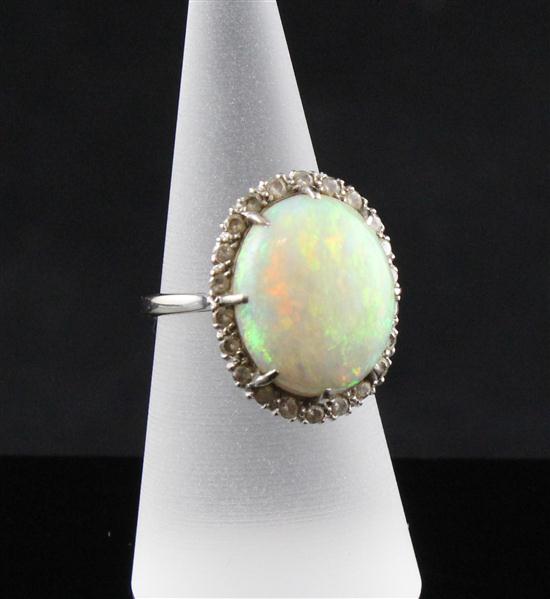 An 18ct white gold white opal and 173abe