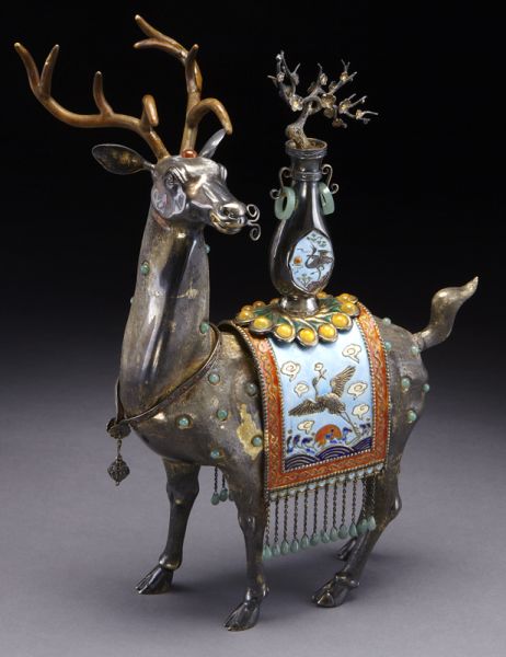 Chinese enamel over silver deer carrying