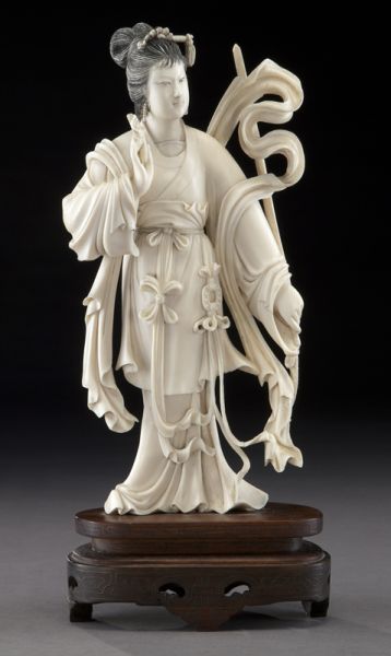 Chinese carved ivory lady holding a