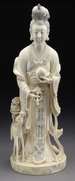 Chinese carved ivory figure (International