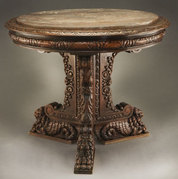 Continental carved walnut marble