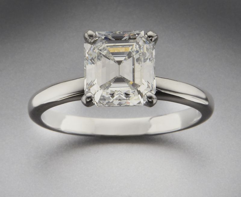 Plat and emerald cut diamond engagement 173d85