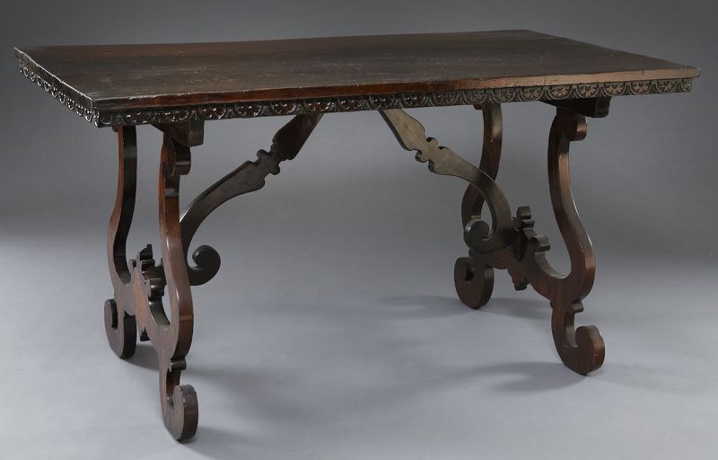 Italian style trestle table having a