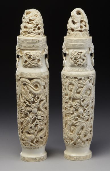 Pr. Chinese carved ivory vases depicting