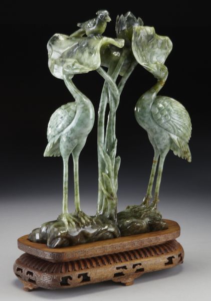 Chinese carved jadeite statue depicting