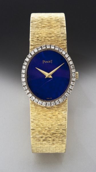 Piaget 18K gold diamond and lapis wristwatchhaving