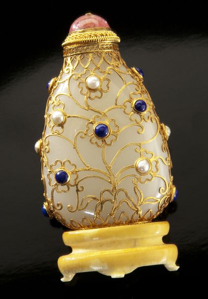 Chinese Qing gold filigree over white