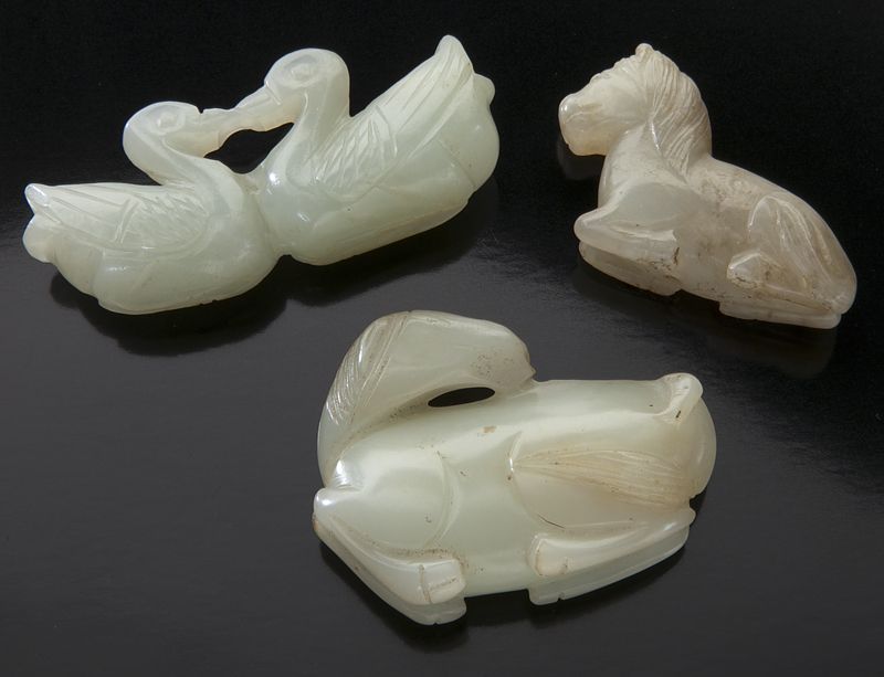 (3) Chinese Qing carved jade togglesdepicting
