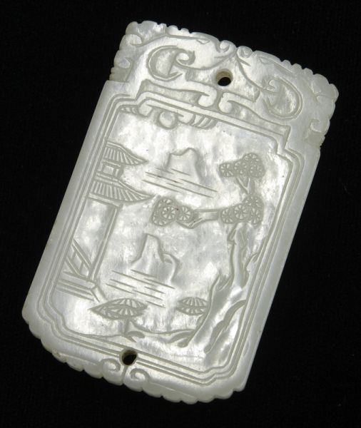 Chinese Qing carved white jade