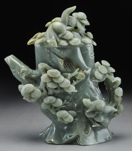 Chinese carved celadon jade tea potdepicting