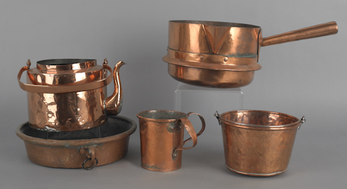 Group of five pieces of copper cookware.
